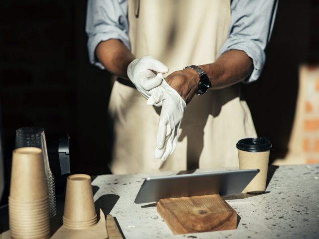 Getting started of barista work day during covid-19 pandemic and social distancing